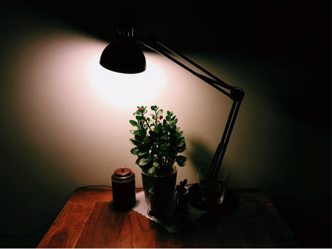 Table lamp in dark room