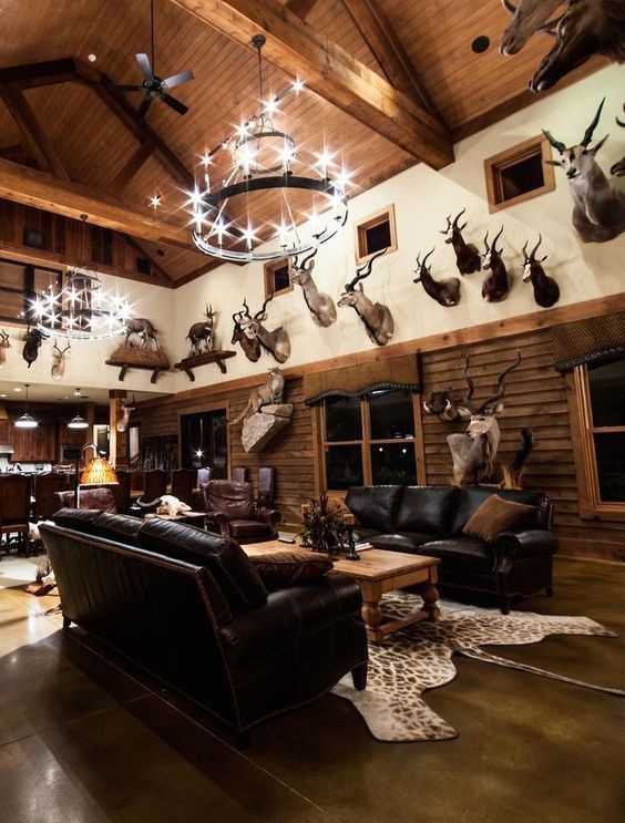 deer heads on the walls of a country style barn