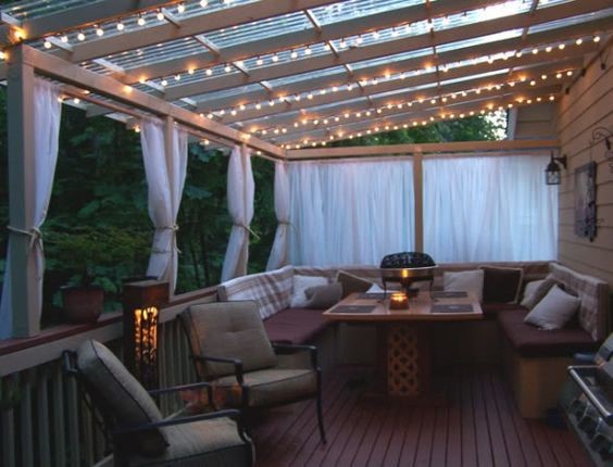 enclosed deck with string lights