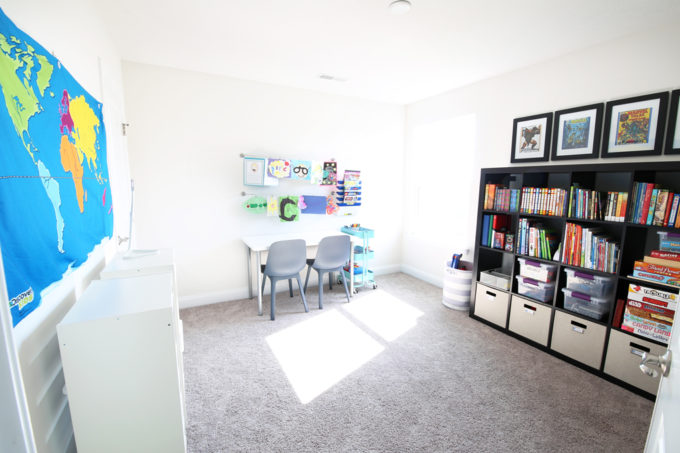 fun homeschool classroom with bookshelves