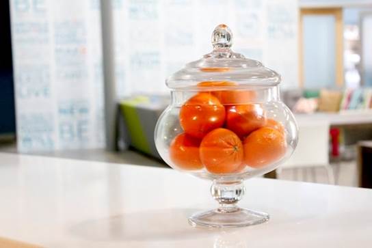 Oranges in glass jar