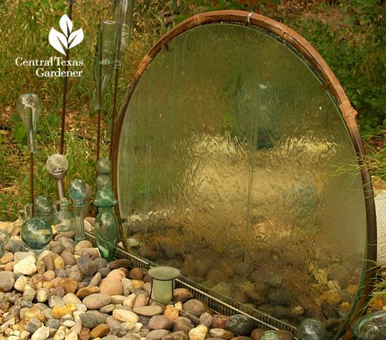 Water wall built from recycled glass table top