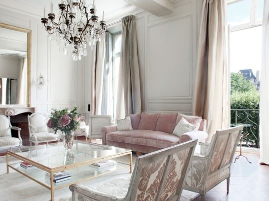 long luxurious drapes in front of large window in home