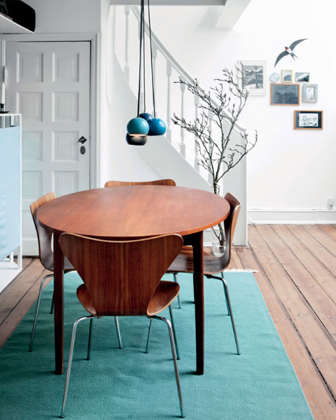 Kitchen table with teal rug