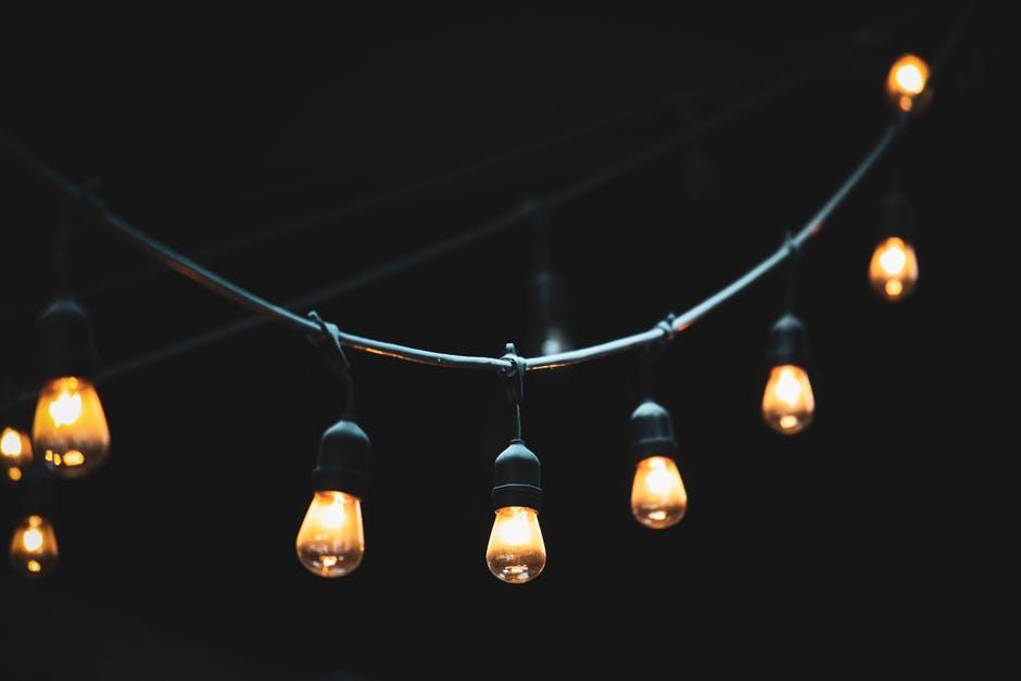 outdoor string lights in the night sky