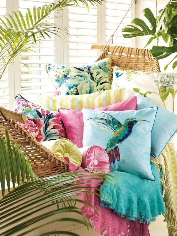 tropical pillows on an indoor hammock