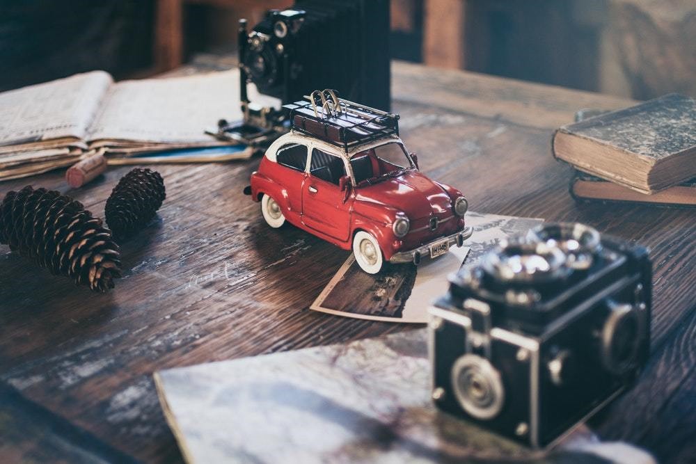 vintage red car on old table