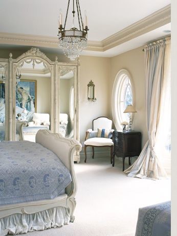 white bedroom with light blue undertones