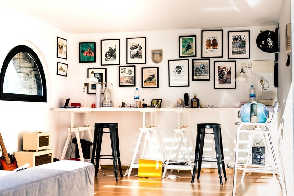 white modern bar with pictures on the wall